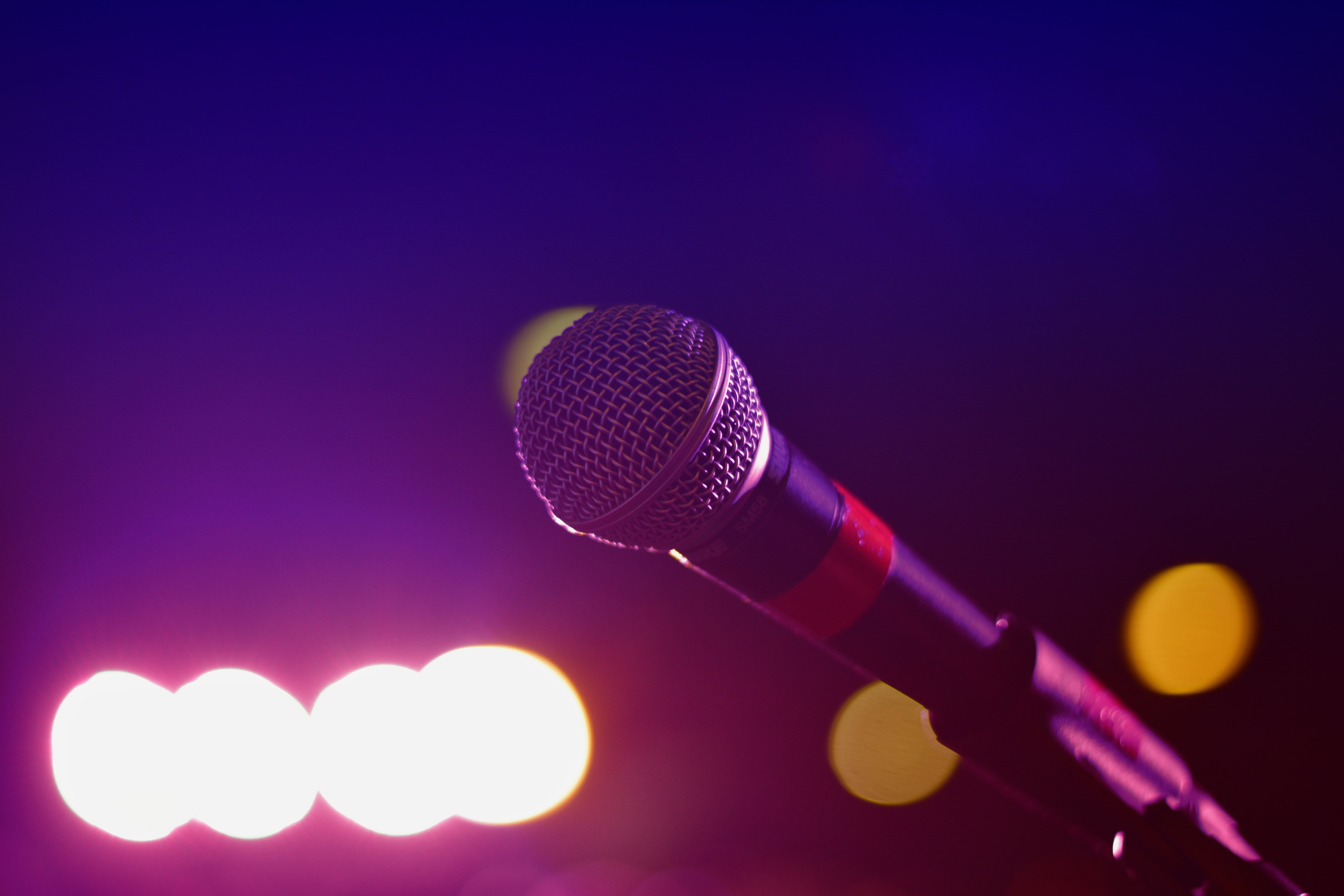 bokeh photography of microphone black music musician band 2k 4k 5k