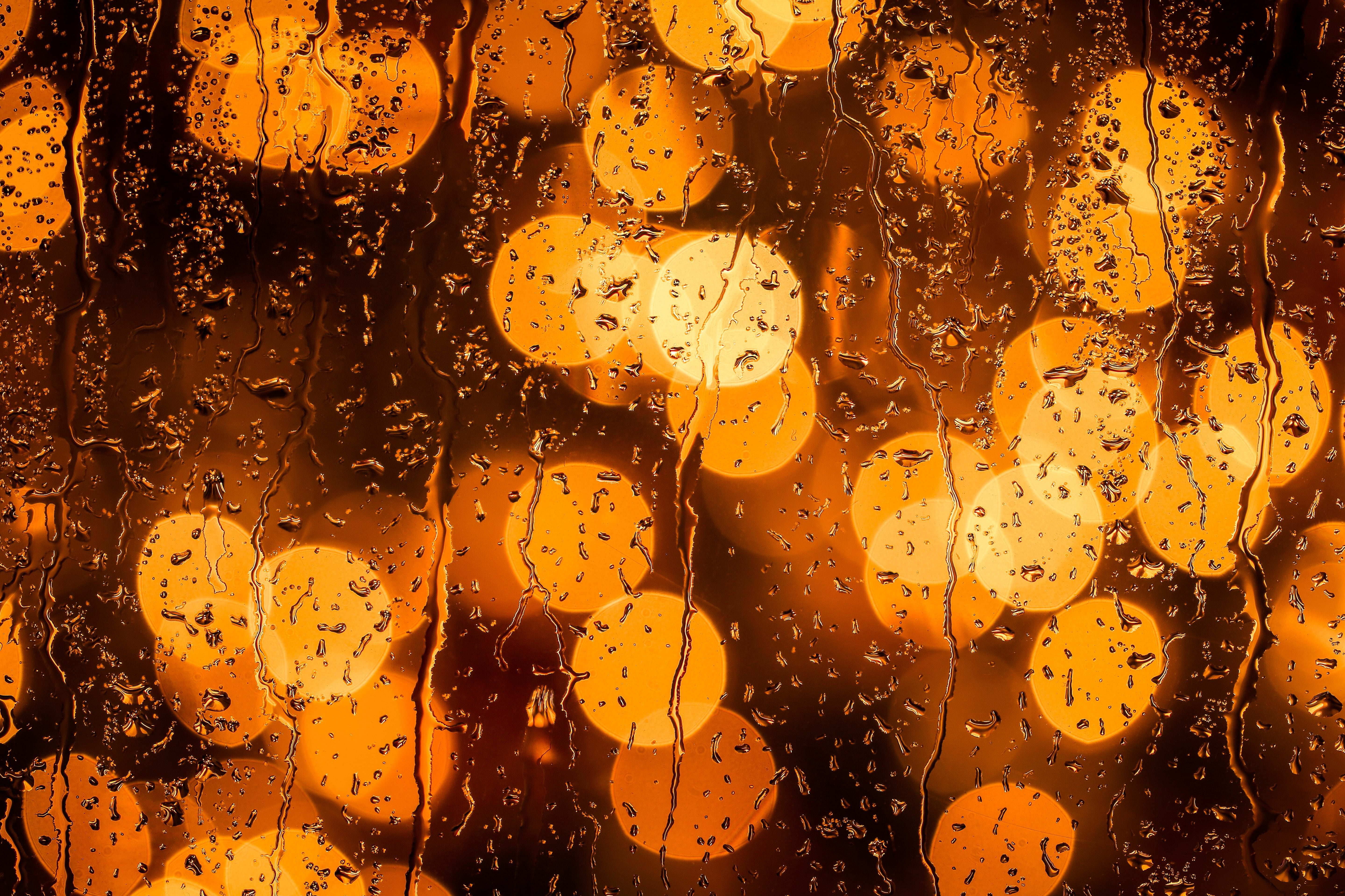 rain macro bokeh water on glass orange 2k 4k 5k