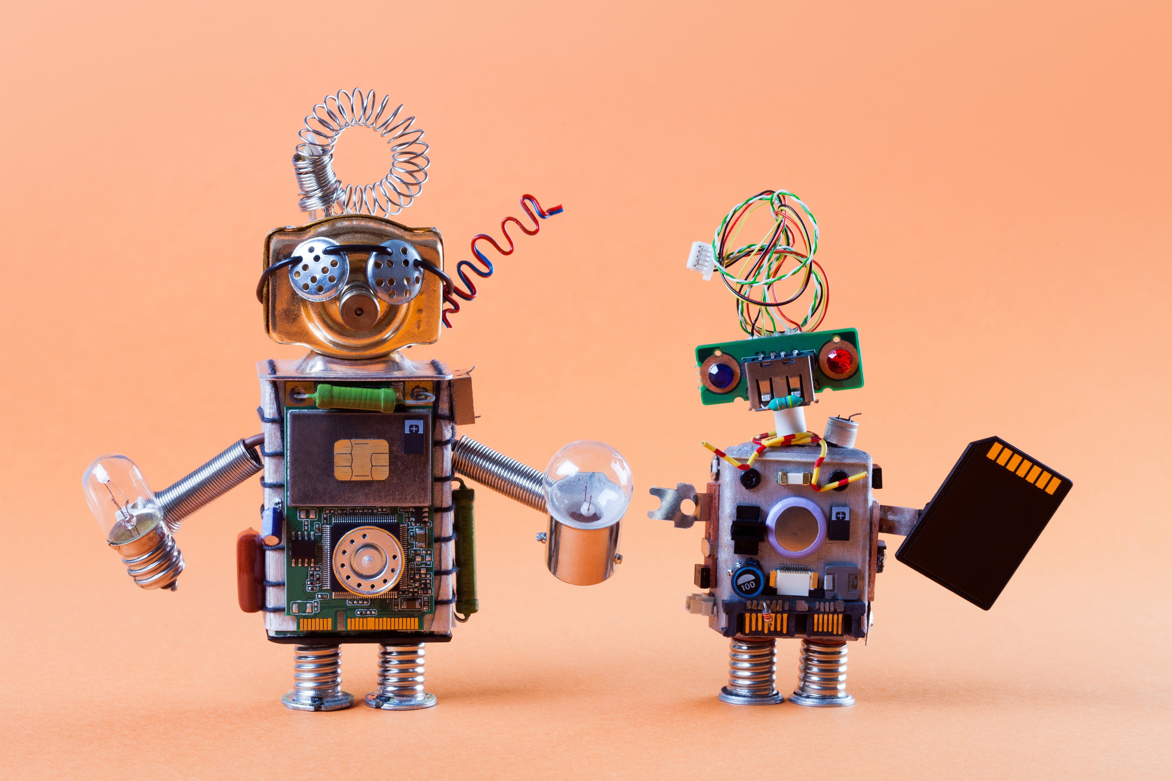 two robot illustrations chip fee robots light bulb figures 2k 4k