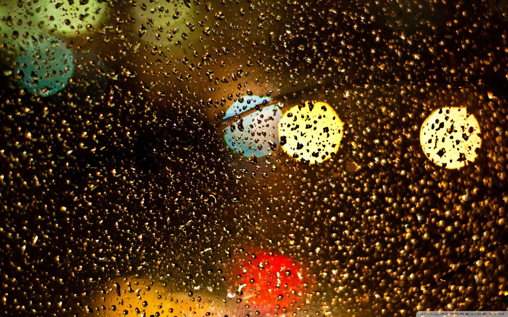 water droplets on glass bokeh wet illuminated night 2k