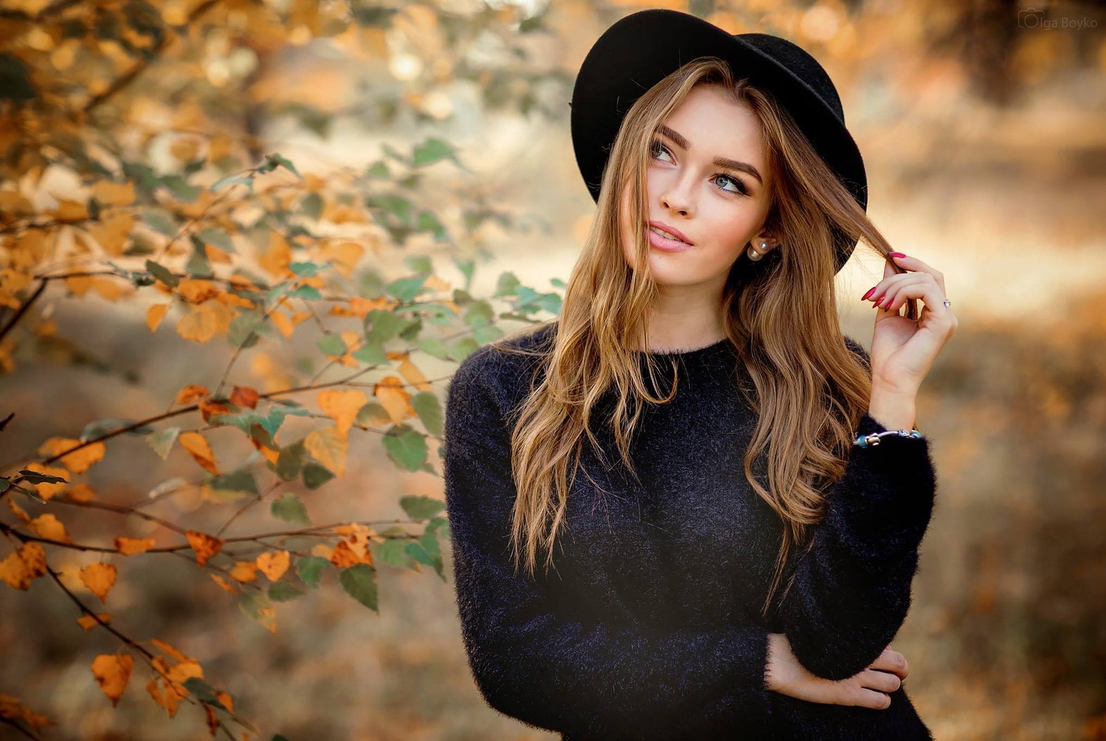 women s black long sleeved shirt autumn leaves branches pose 2k