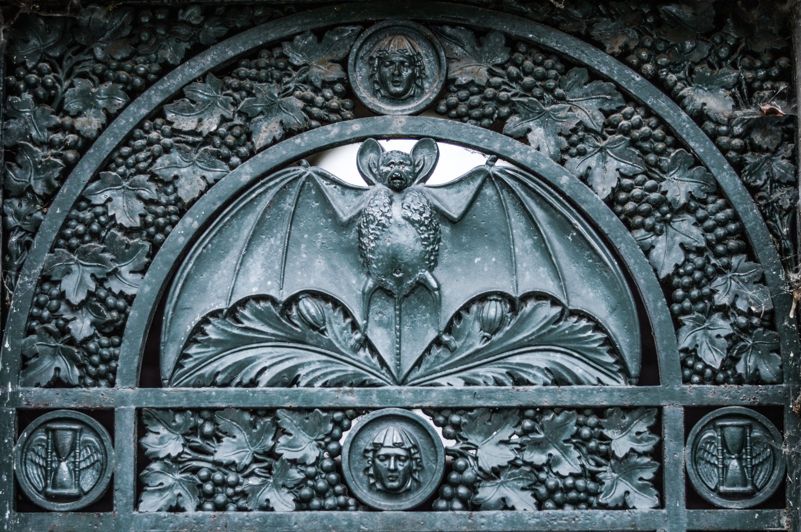 gray steel bat wall decor door detail old dark cemetery 2k 4k 5k