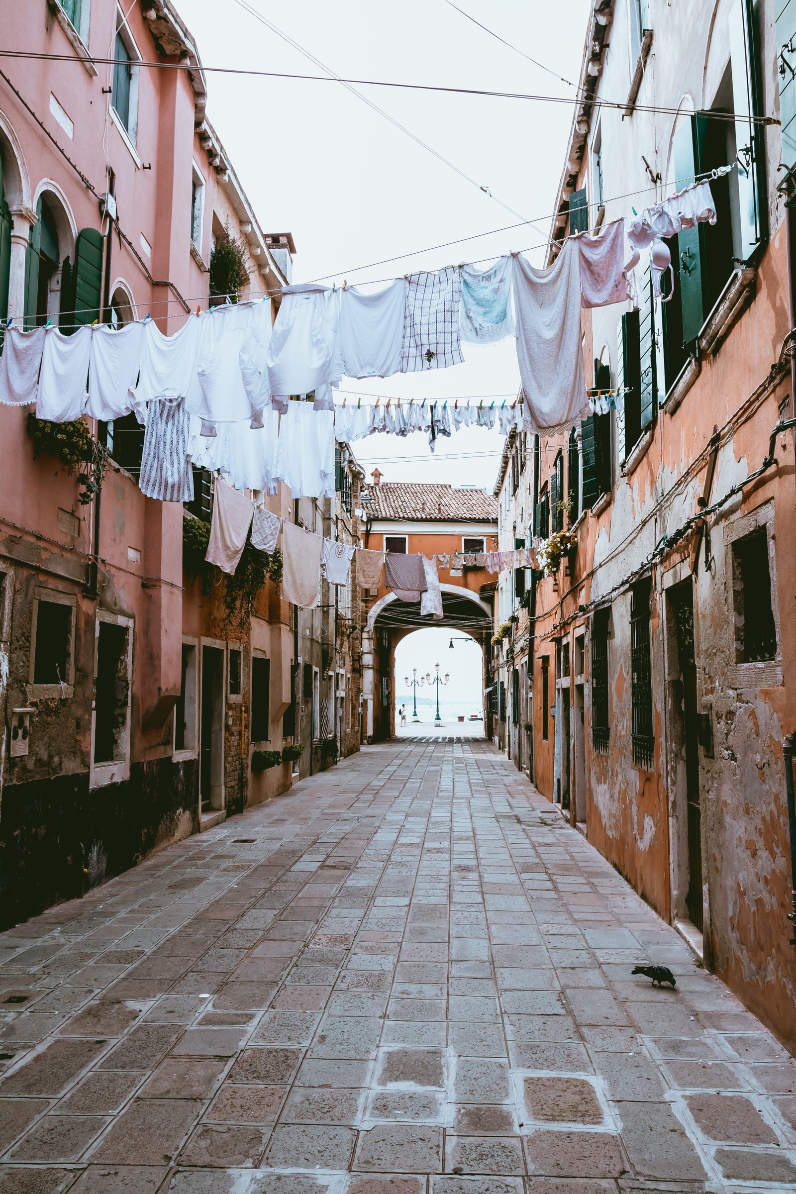 multicolored hanged clothes clothesline clothing towels building 2k 4k