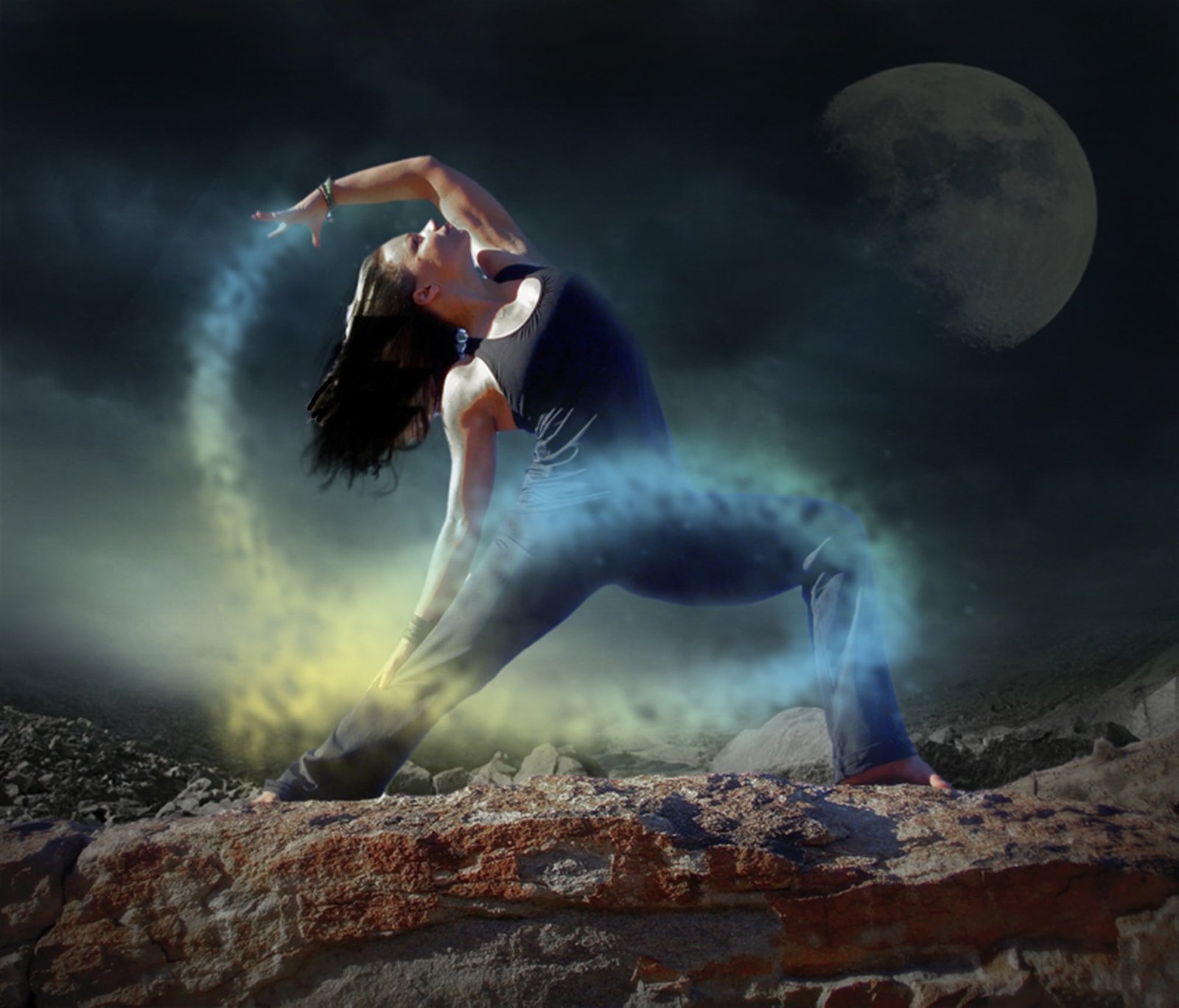 woman wearing black tank top and pants during night time yoga 2k
