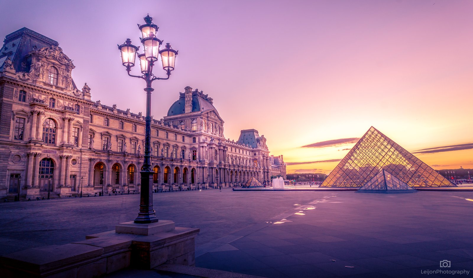 Louvre pyramid glass near building during sungset city art 2k 4k 5k