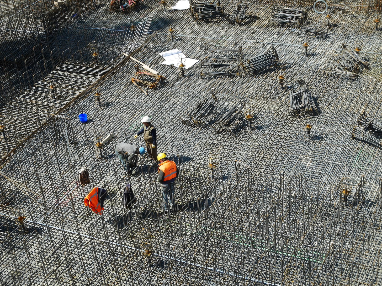three man working together construction site workers 2k 4k 5k